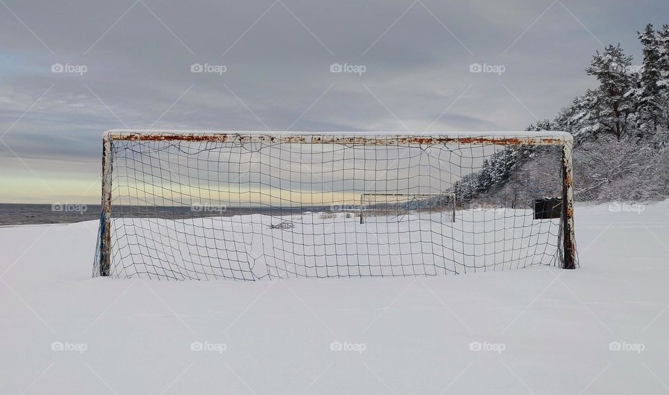 Football goal on the beach in the winter season⬜❄️ Geometry ⬜