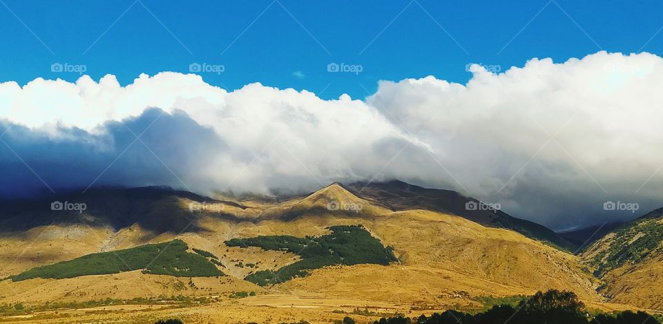 Gramozi Covered by Clouds