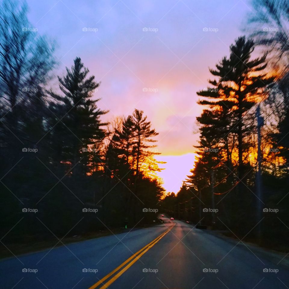 Empty road during sunset