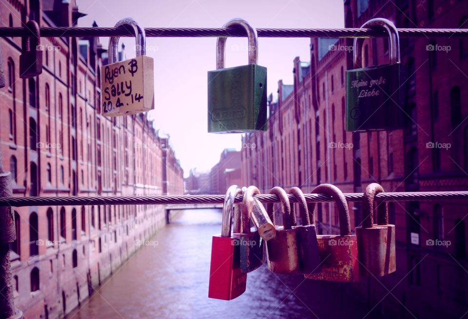 love padlocks on a bridge in Speicherstadt, Hamburg