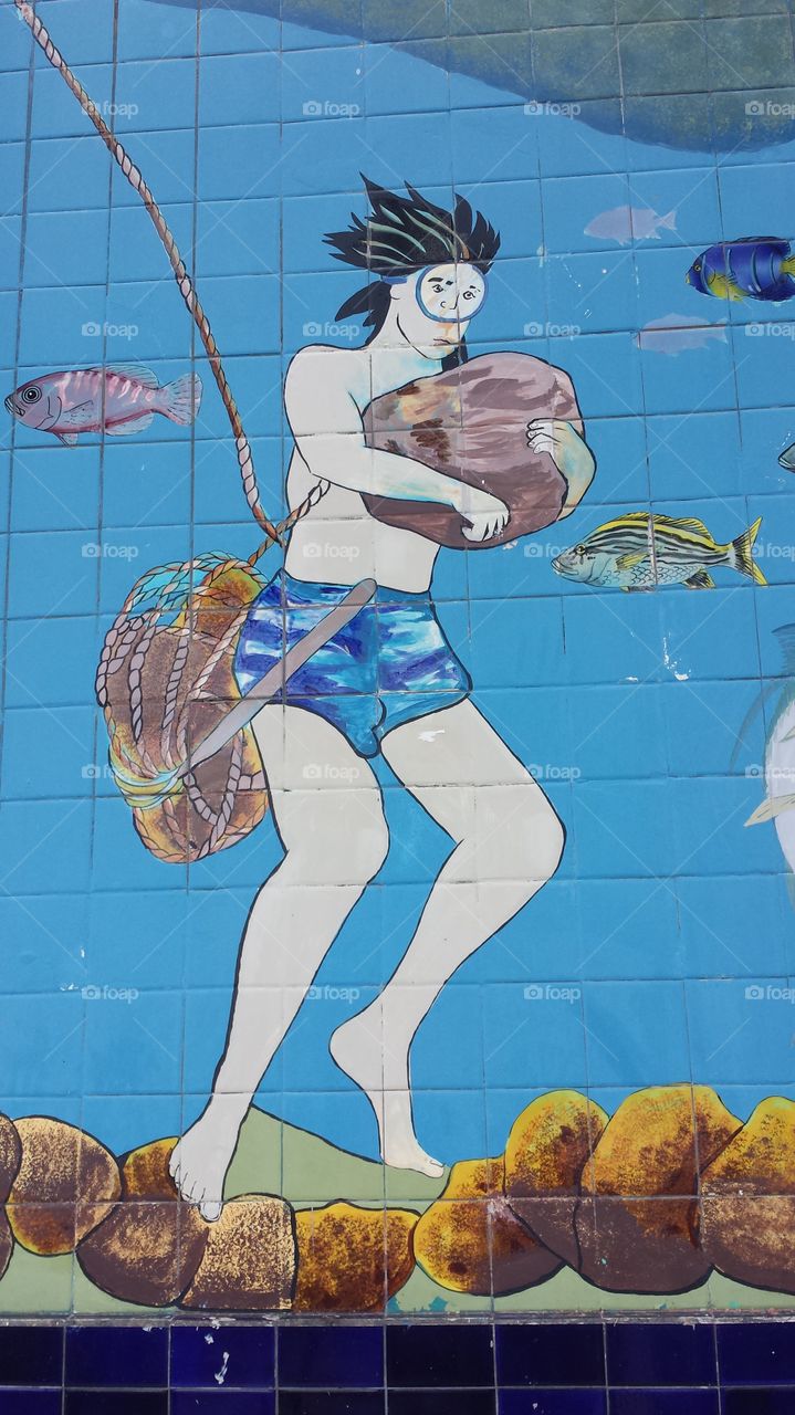 Tarpon Springs Mural. Mural on sponge docks. Sponge diver.