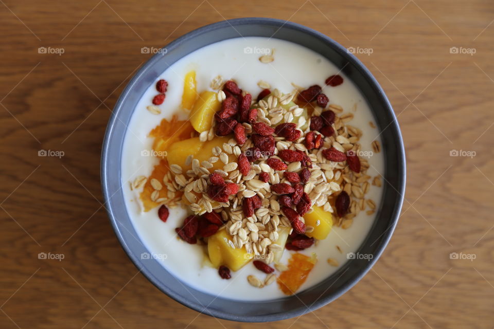 Yoghurt breakfast with fresh fruits and berries
