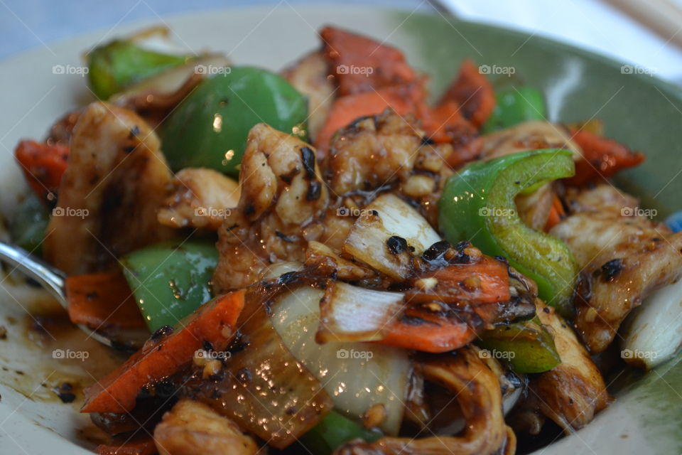 Close-up of chicken and vegetable in bowl