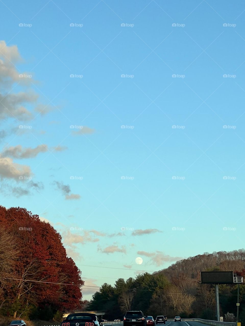 Full moon with a sunset
