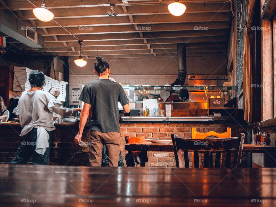 2 servers in a restaurant 