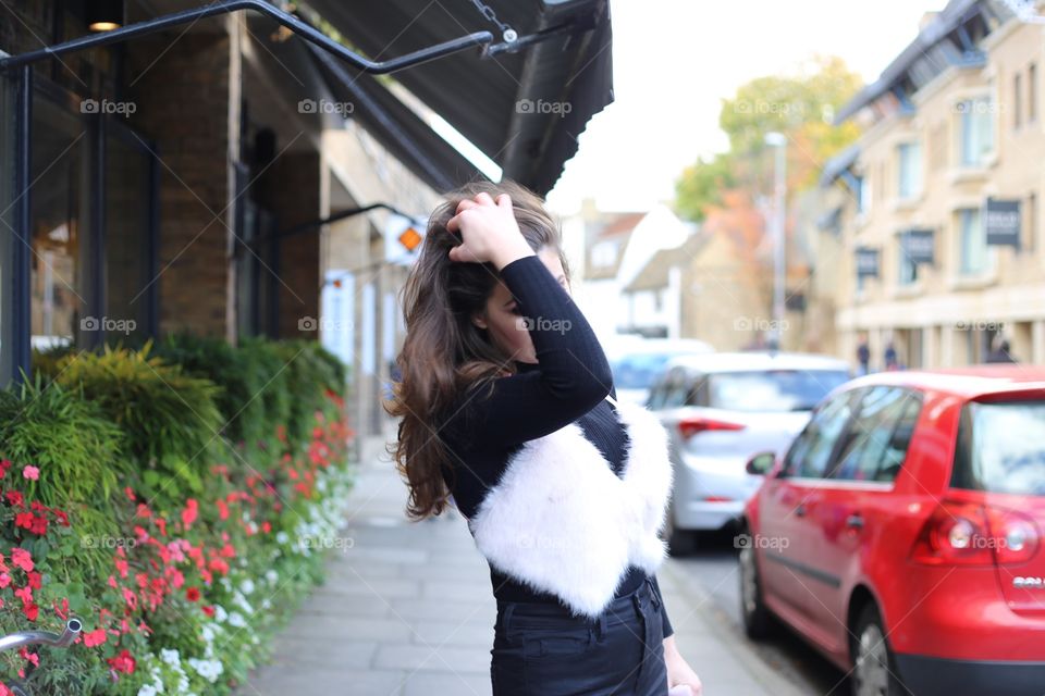 beautiful woman with long hair fur bra let black outfit streetstyle blogger