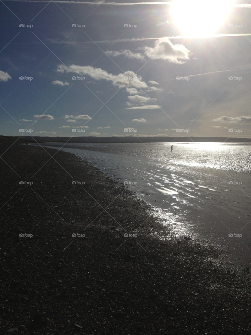 beach sun sea shingle by Ellis