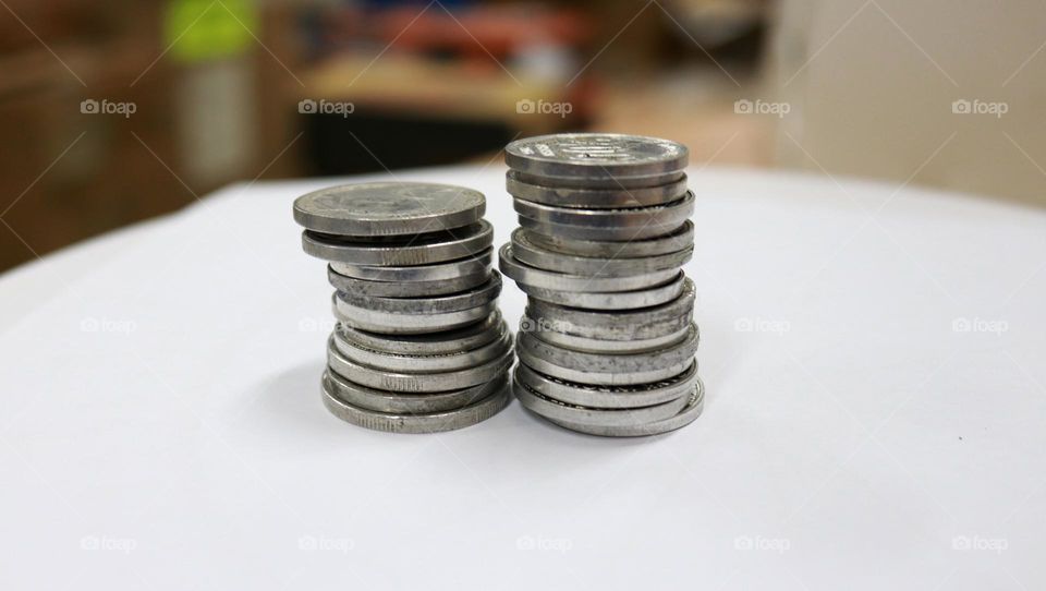 One form of money is coins,paper money and digital money