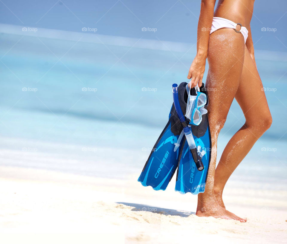 beach water cute legs by Yuri_Arcurs