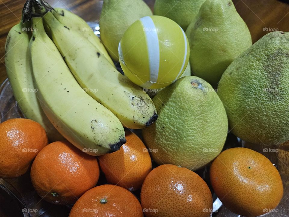 The ball ran into the fruit pile