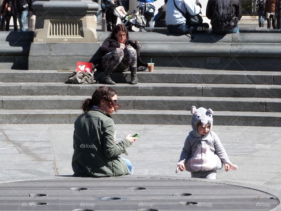 Kid playing at square