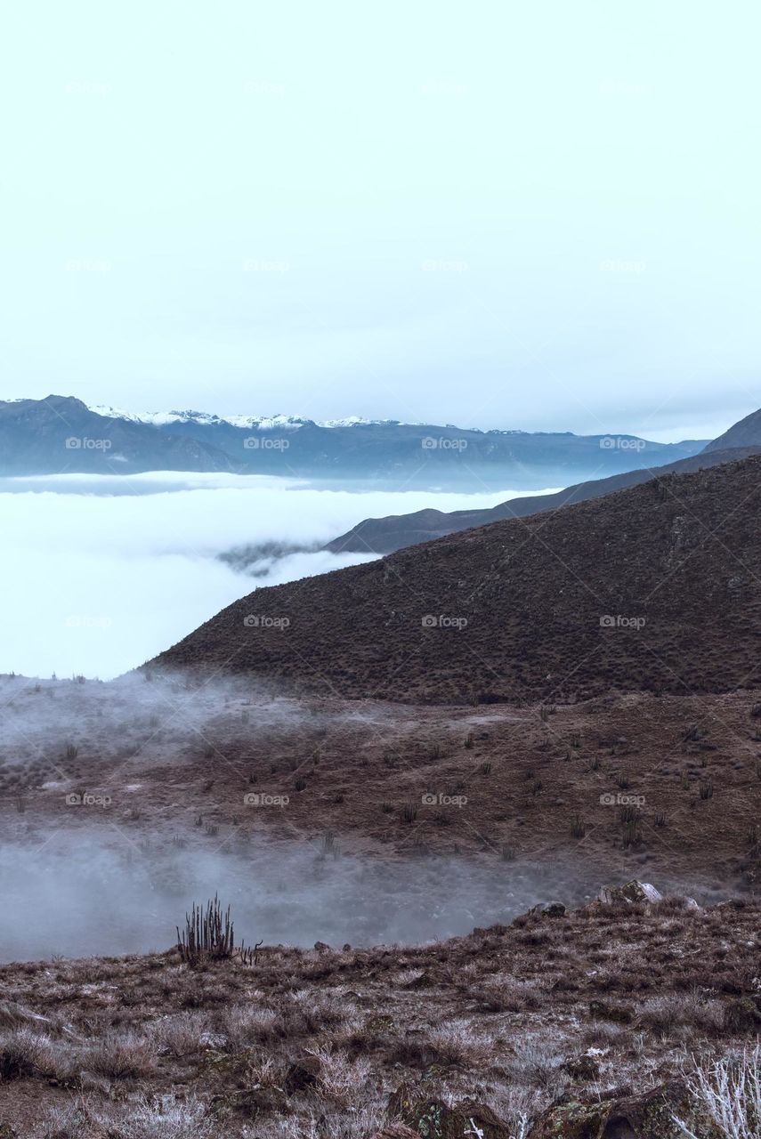 Mountain in the andes with cloudy skies