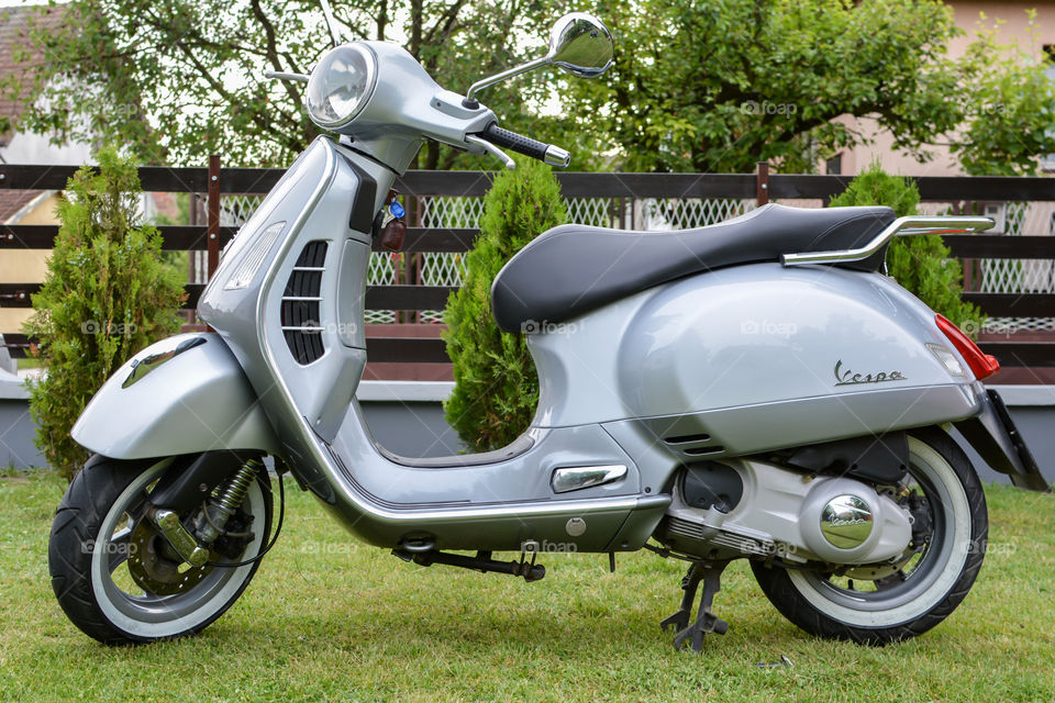 grey vespa motorcycle, italian style