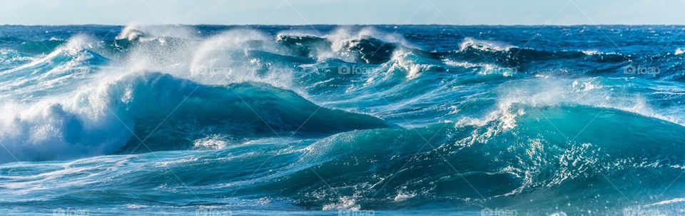 Waves in blue sea