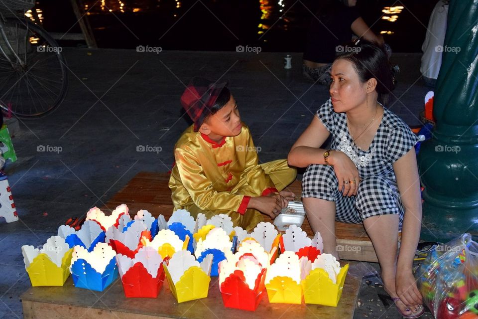 Vietnamese mother and child in Hoi An, Vietnam. Shot with my Nikon on a night walk 