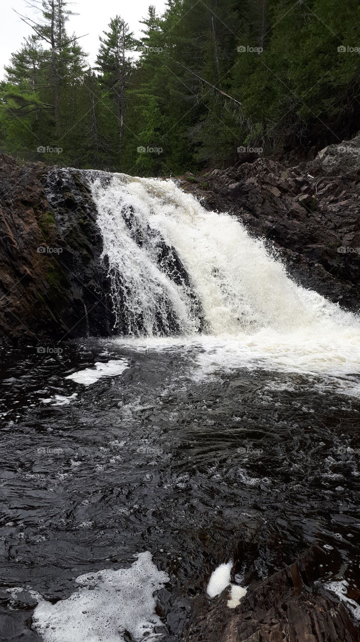 beautiful waterfall at South Branch Falls in NB, Canada. It's a peaceful and serene atmosphere.