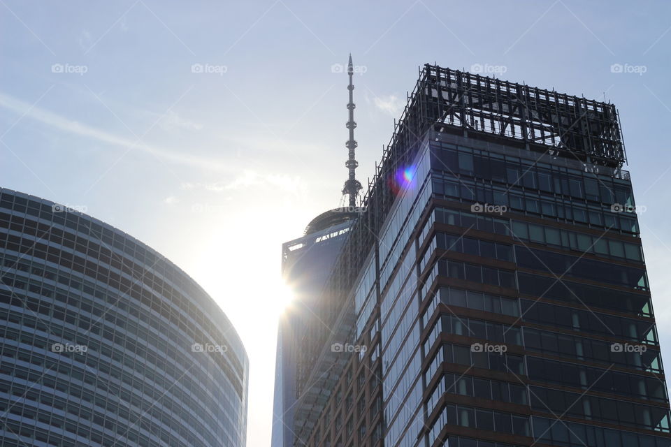 The Sun over NYC. Looking up and capturing the One World Tradr Building