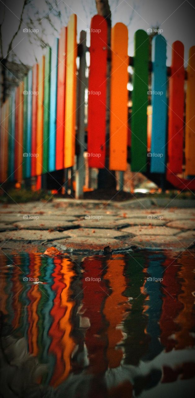 Coloured fence reflection