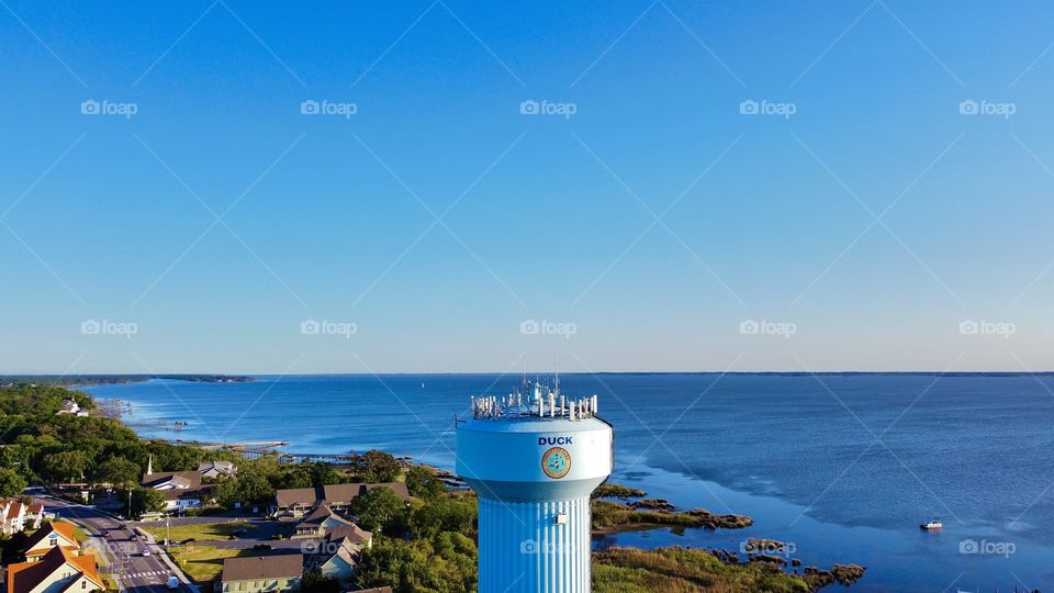 beautiful aerial shot of Ducks water tower right alongside the amazing sound side- taken by aerial pointe drone 