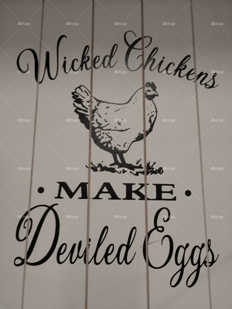 chicken egg quote sign
