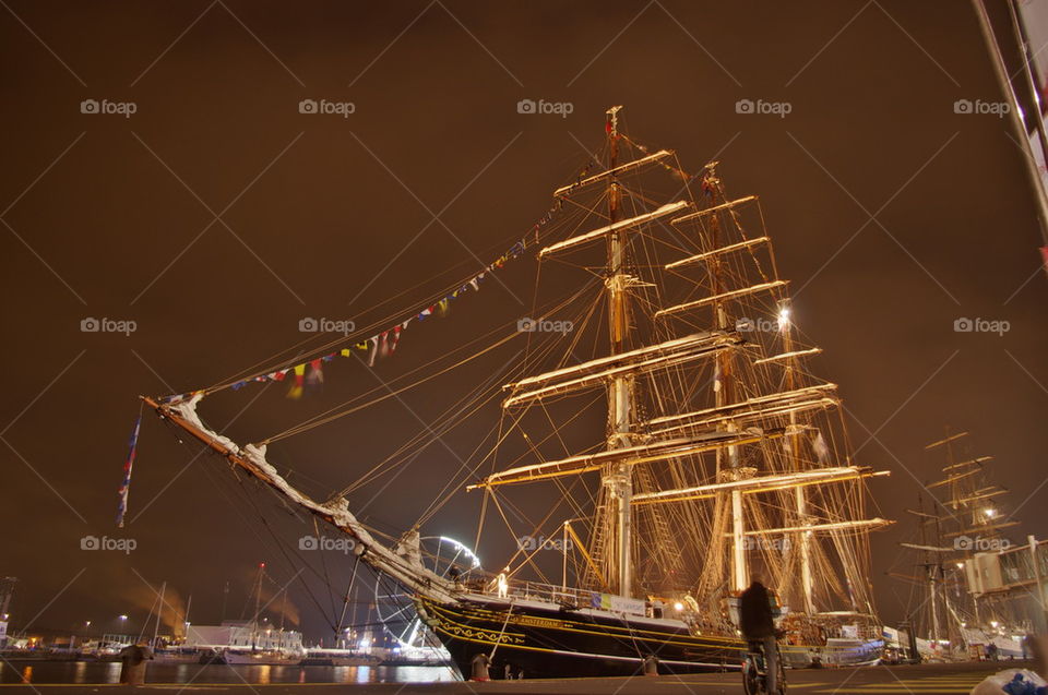 sailing ship at night in Amste