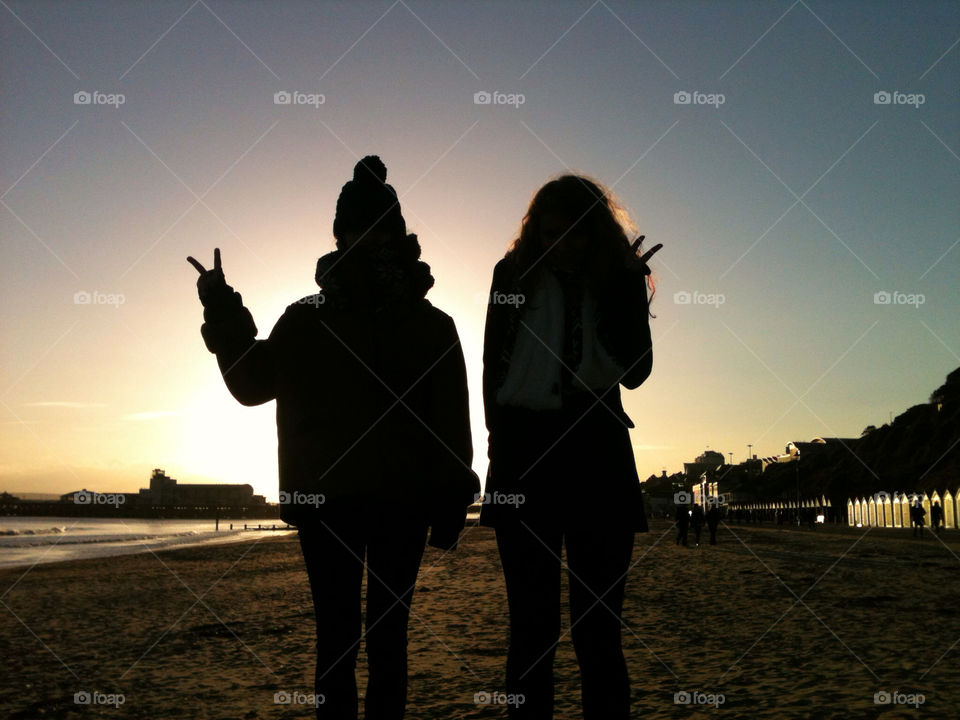 bournemouth beach sunset hands by bryonycork