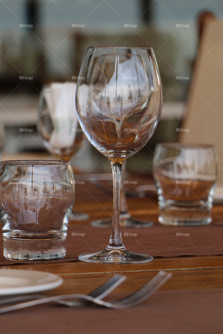 Glass of wine on table
