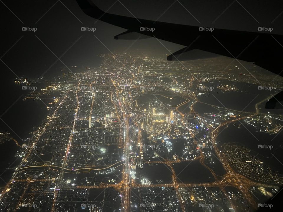 Dubai skyline at night from the sky