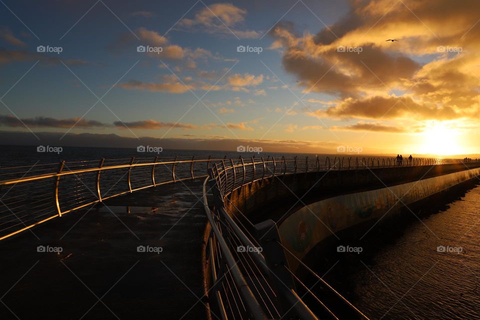 Sunset on breakwater 