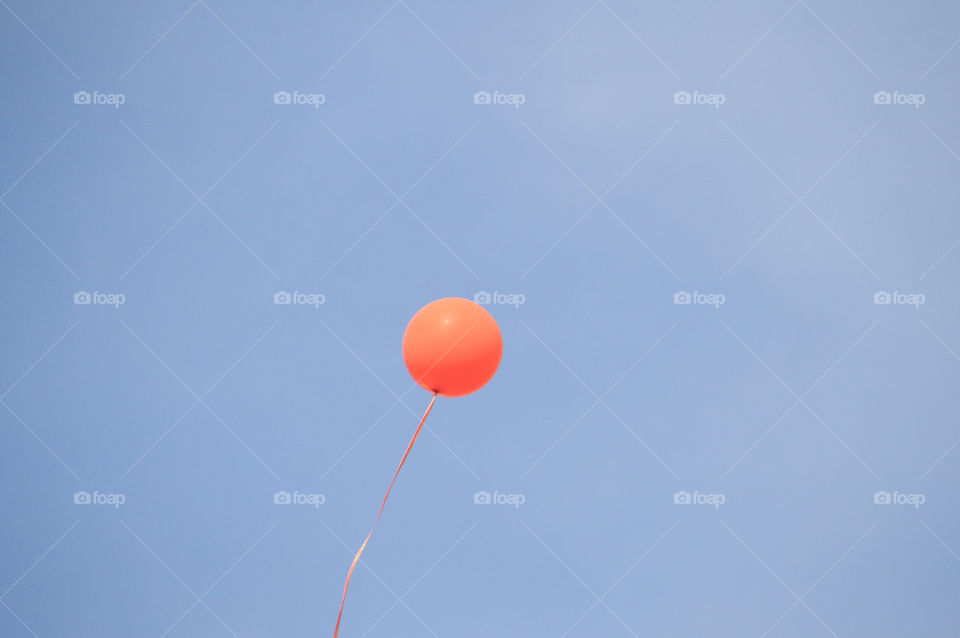 Orange Balloon In The Sky