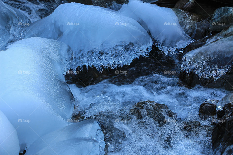 Water turned into snow in winter season. Sondrio city, Italy