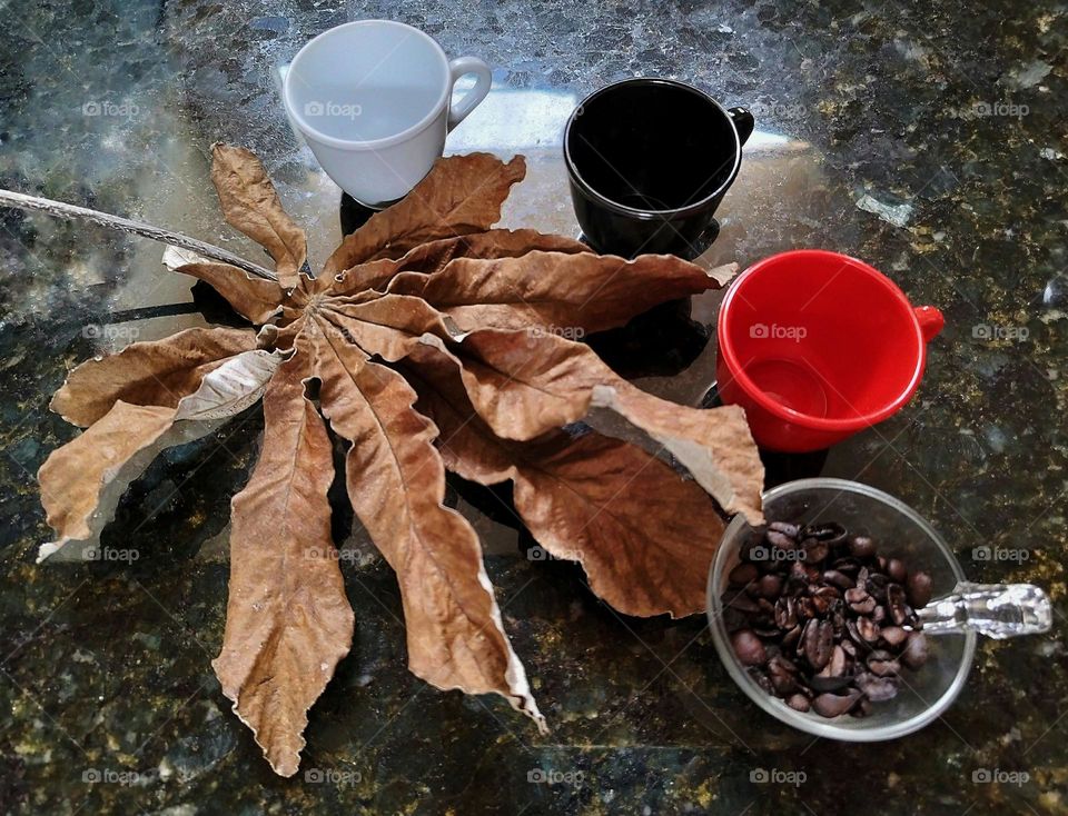 colorful coffee cups and coffee beans