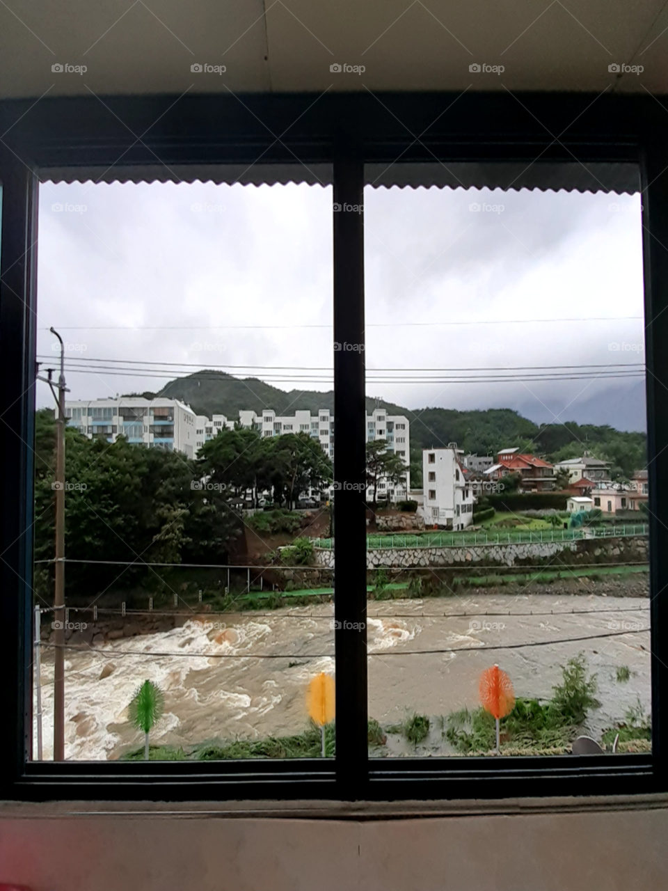 Today the weather is gloomy because this days it keeps raining  and it made this rivers water rapidly increasing.