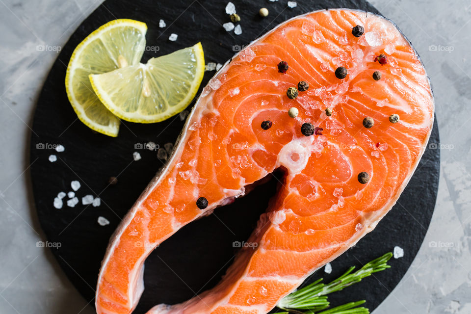 Flat lay of raw salmon fish