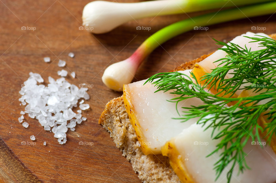 Salted fatback served with young onion and garlic