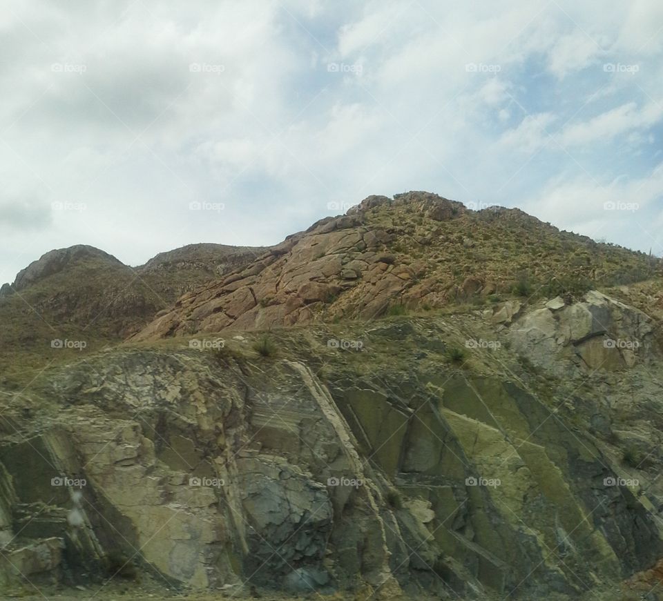 Green Mountains and Overcast Sky