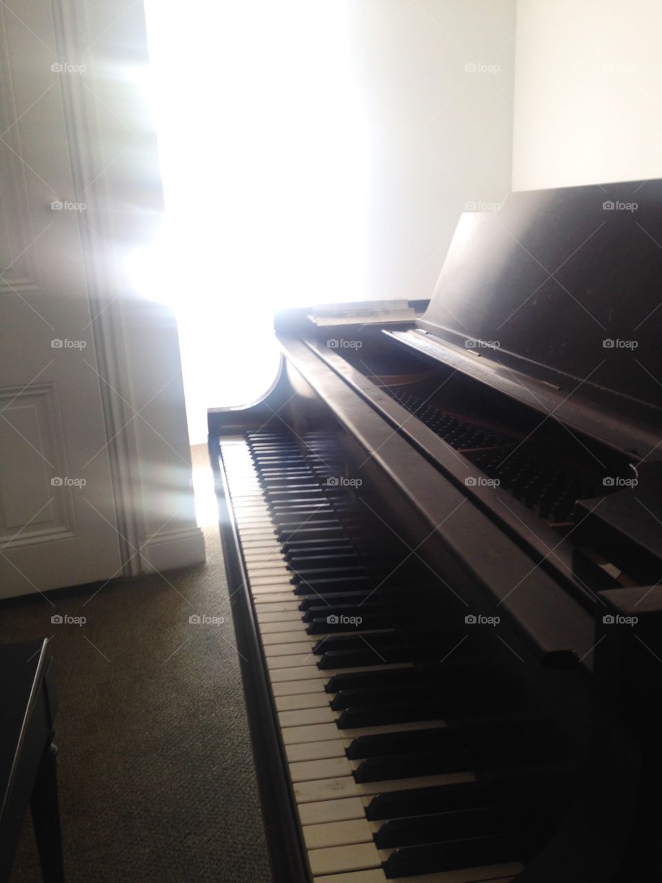 Piano in sunlight . Taken at the Academy of Vocal Arts in Philly