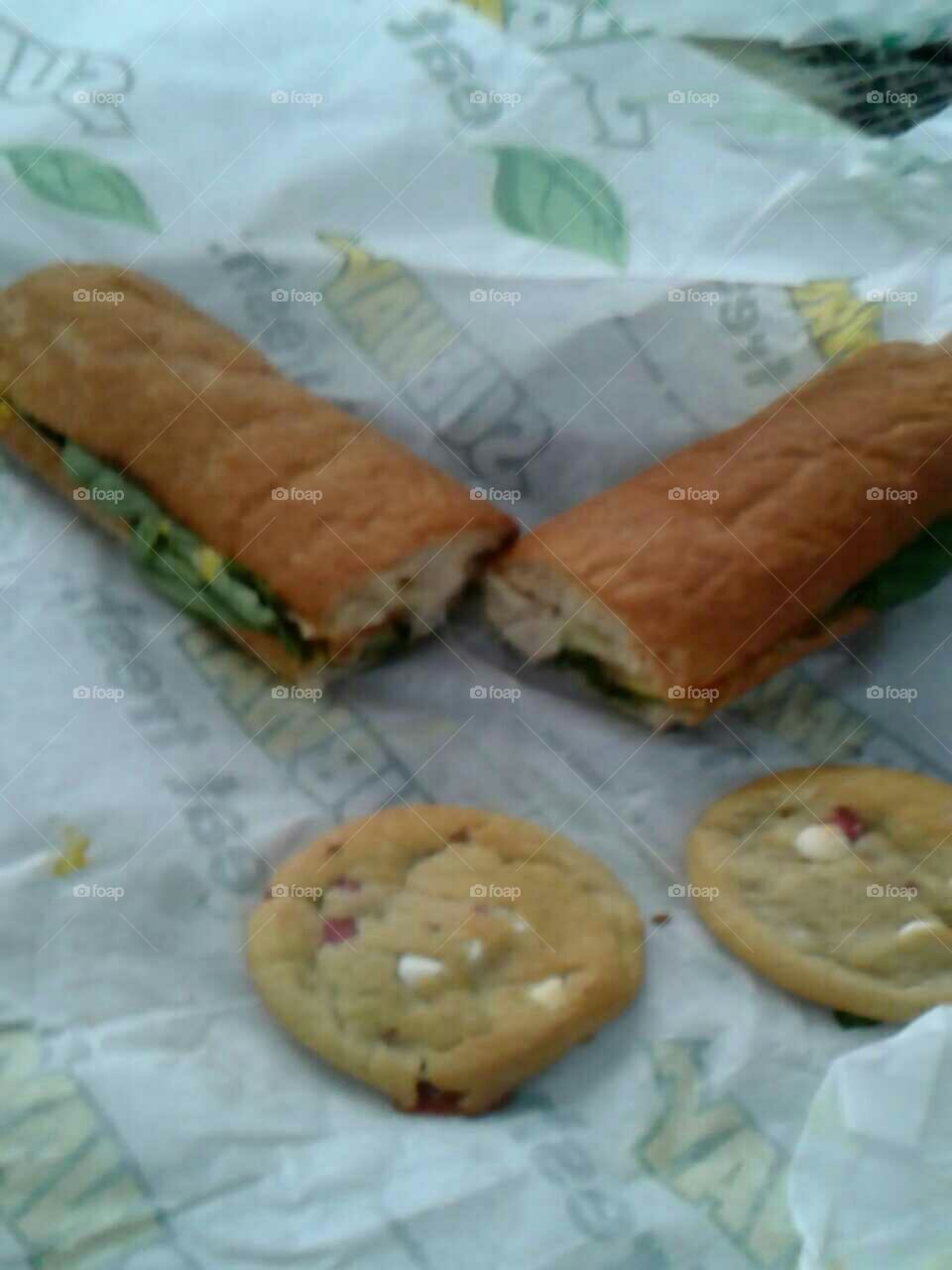 Raspberry cheesecake cookies with a footlong Subway sandwich.