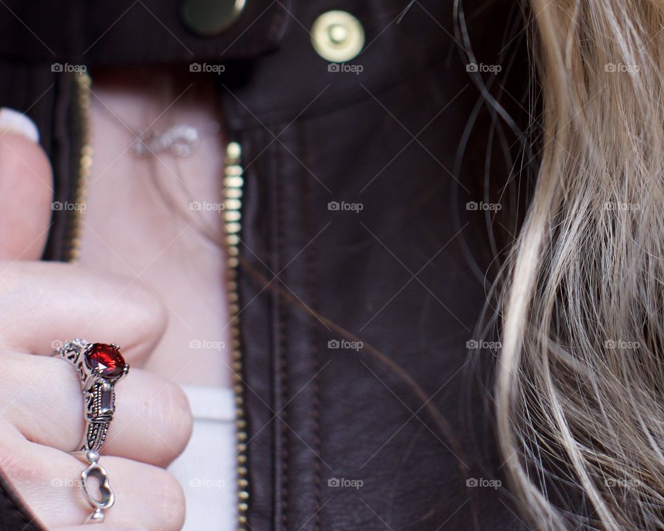 Red Ruby Ring and a leather jacket
