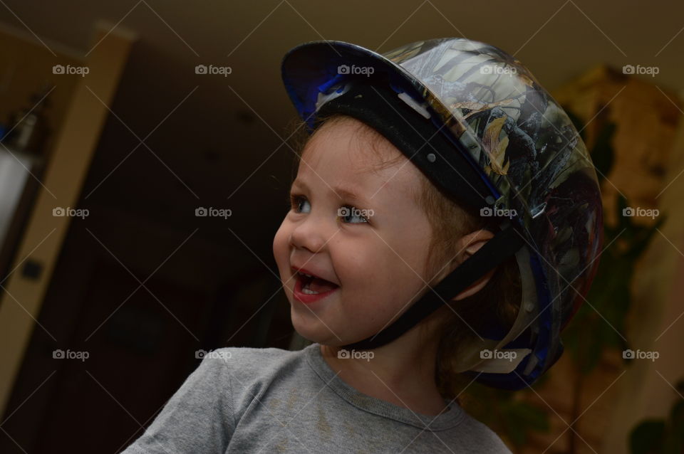 Smiling cute baby wearing hat