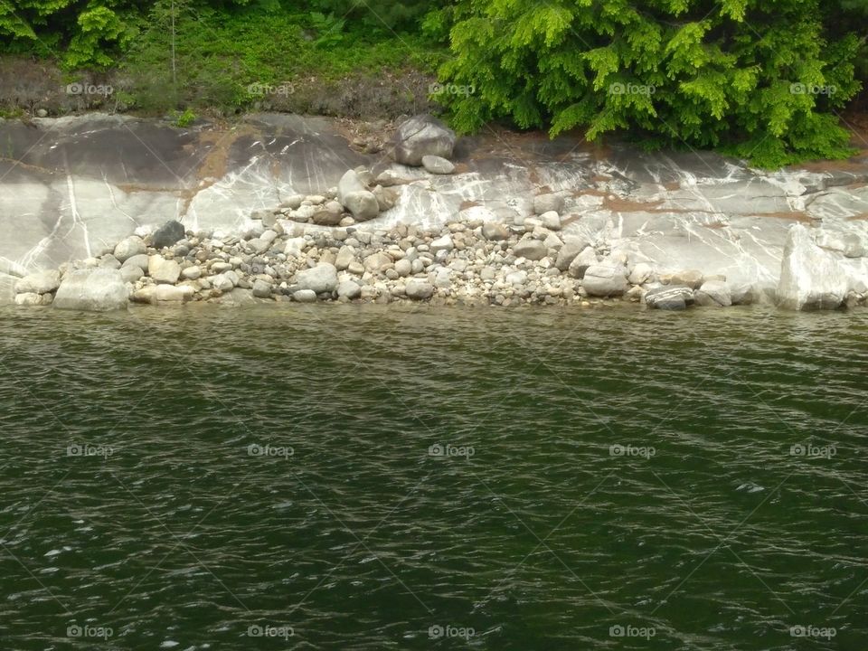 some type of drawing on the rocks to the right