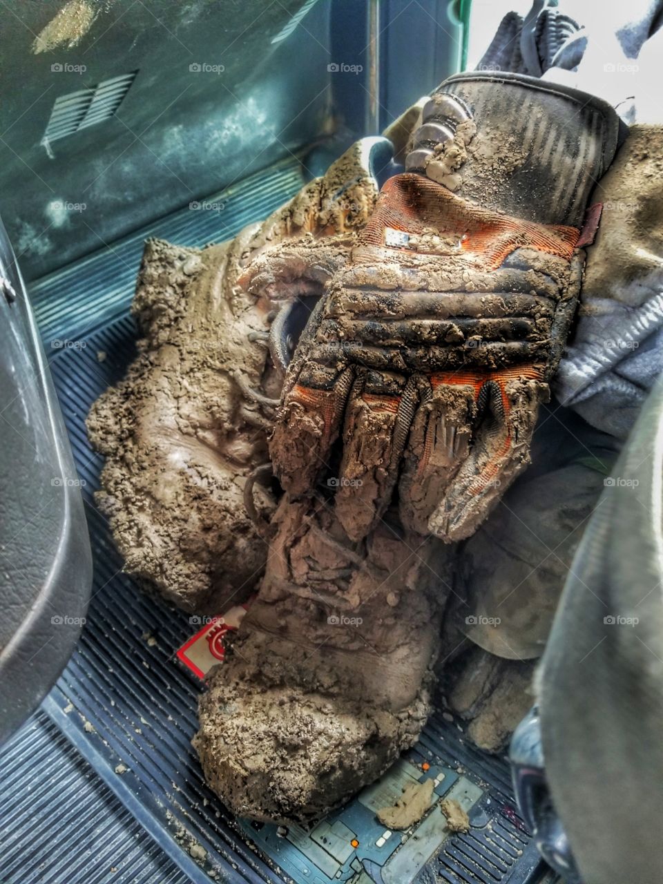 mud on work boots. a day in the oilfield.