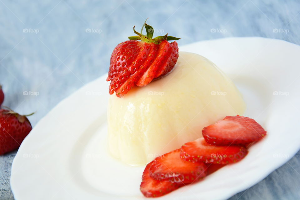 Panna cotta. Panna cotta dessert with strawberries