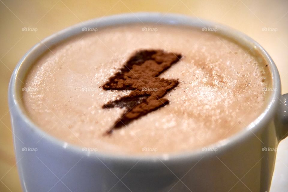 closeup of the design on a mug of hot chocolate drink