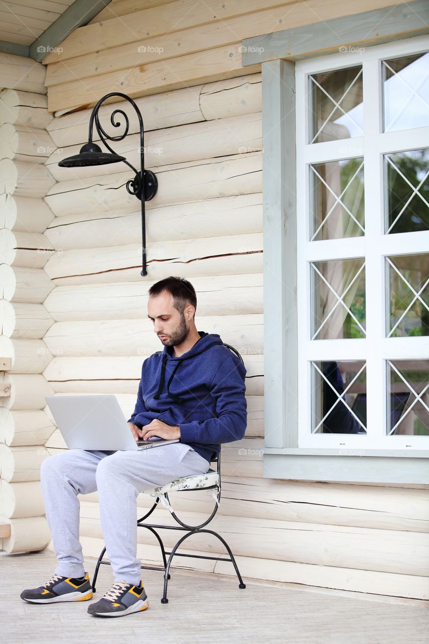 man working with laptop