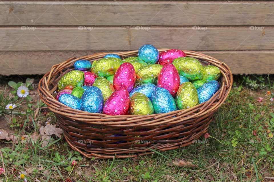 Basket of Easter eggs in the garden