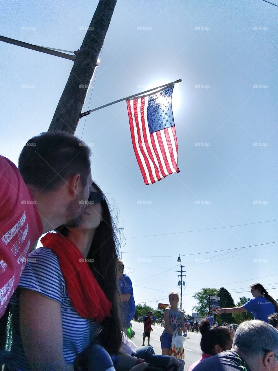 Kissing under the American flag