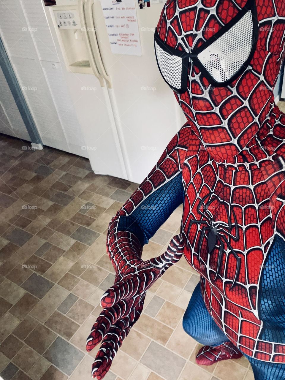 Spider-Man in the kitchen, dressing up for kids, dressing up in costumes, spider man suit 