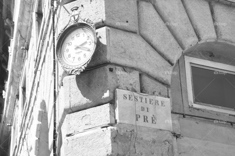 Old clock in Genoa