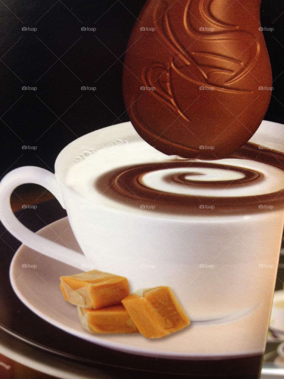 Close-up of coffee with chocolates